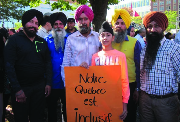 “Sikhs fought in two world wars with the French and English and sacrificed their lives. If Sikhs could lose their lives then, wearing turbans, why not now? The PQ  is trying to show the fanatics that they are crushing minorities to get votes. I would not work for the government if I had to take off my turban. Since the charter,  I have encountered some anti-immigrant behaviour I did not see before.” ~ Narinder Singh Minhas (left), a trucker