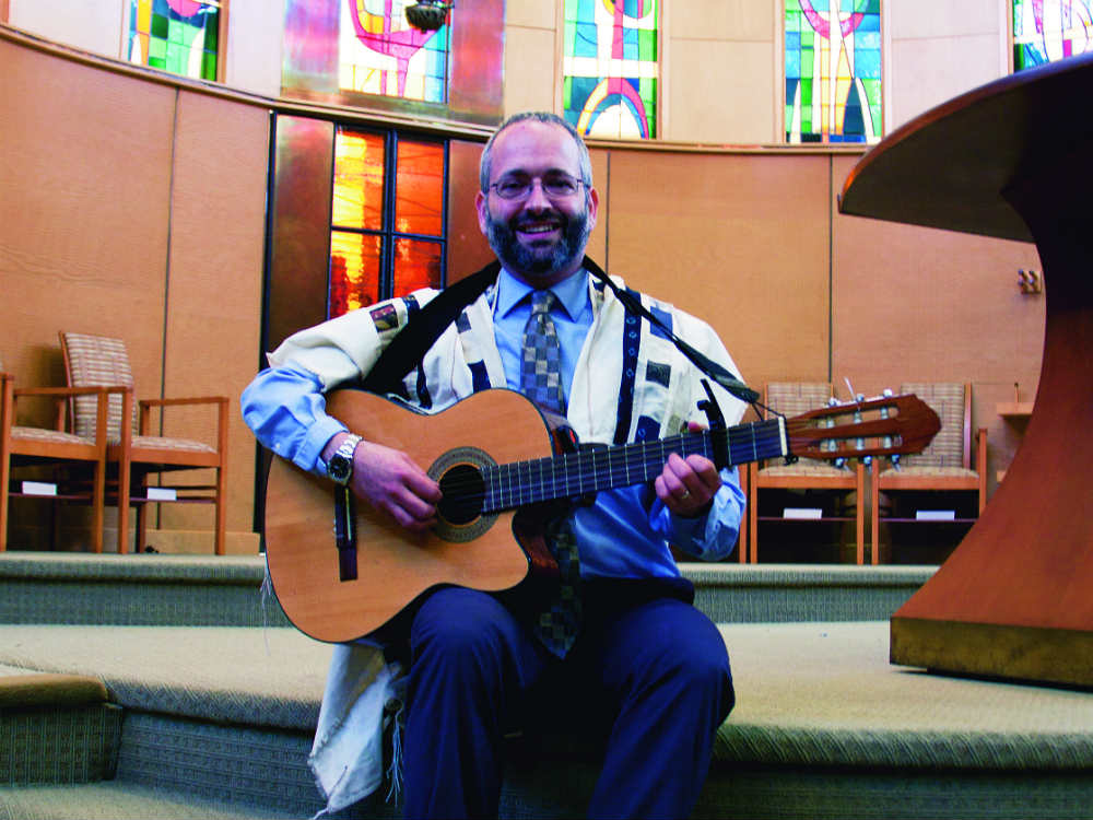 Rabbi Boris sings his way into the hearts of his congregation. Photo: Hawk Andiqwar