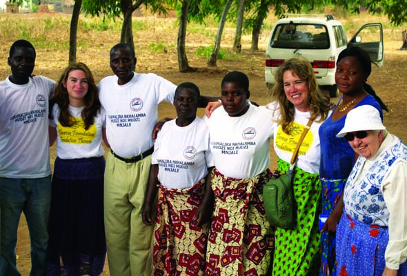 Three generations of Abracen, Lambert Family L to R: Alice Abracen, Ann Lambert, and the Sister Gisele Leduc at far right, with Malawi friends.
